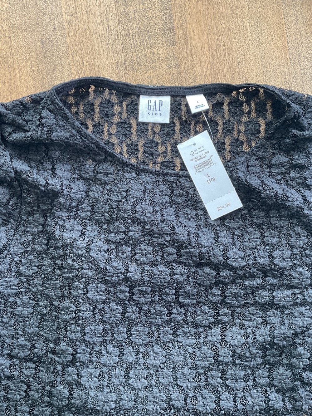 Girl’s black lace top with built in tank top